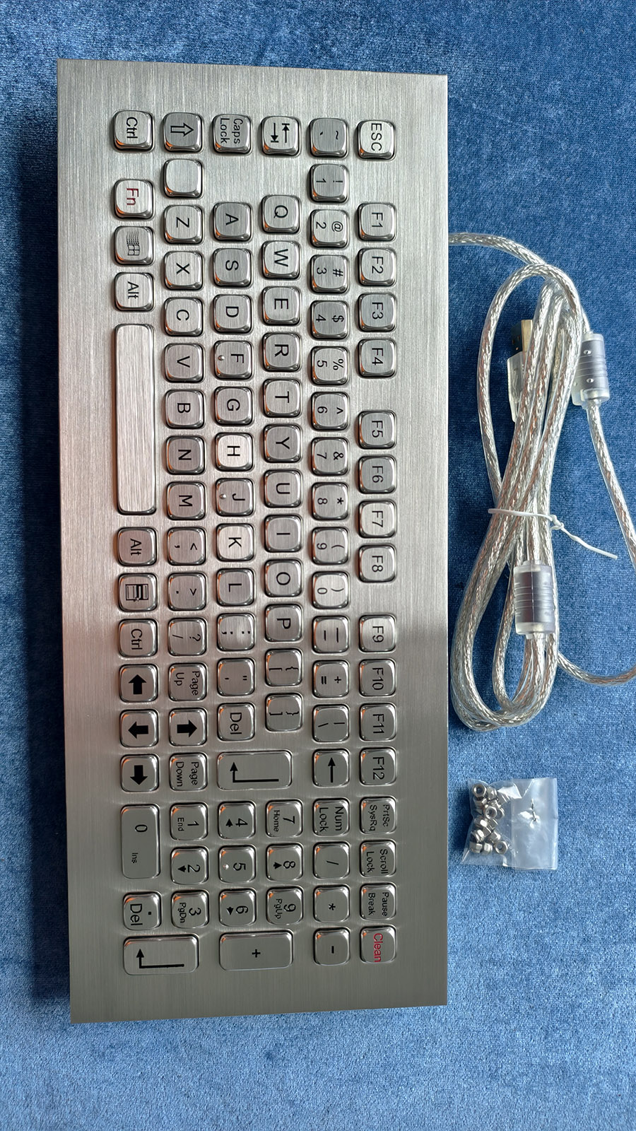 Front view of the Newdesy K-TEK-A360KP-FN-DWP stainless steel industrial keyboard with full QWERTY layout, function keys and numeric keypad